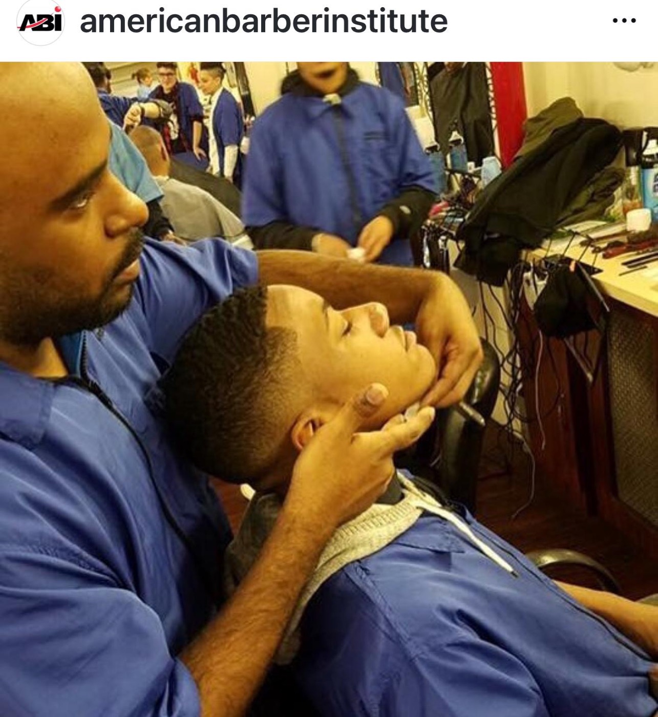 Student grooms client's face