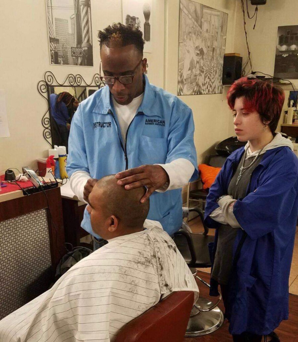 Instructor demonstrating cut to student