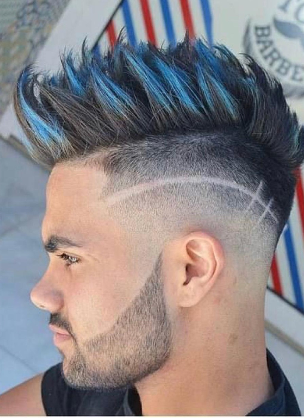 Blue spiked fade with line design