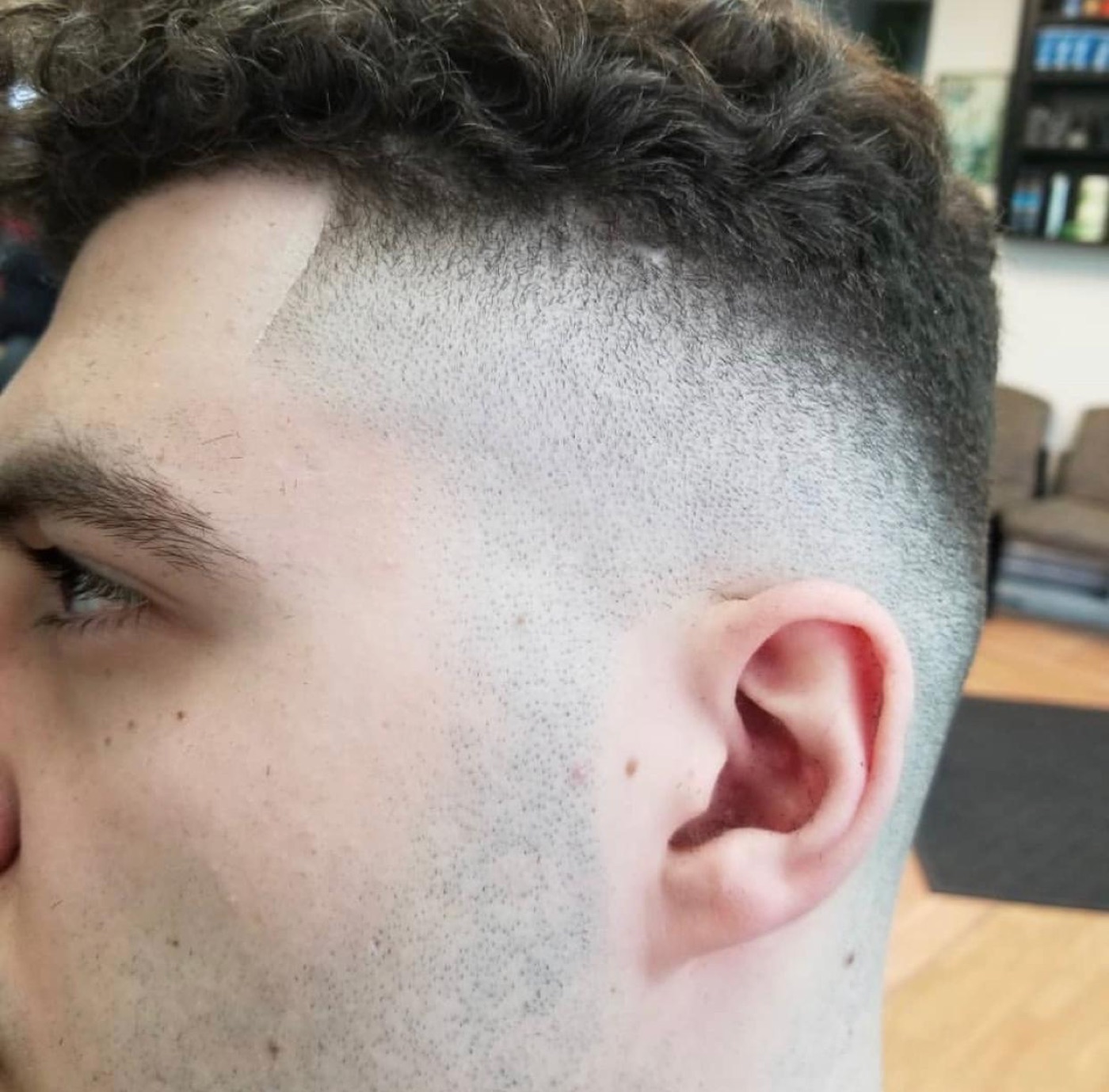 Clean curly top skin fade