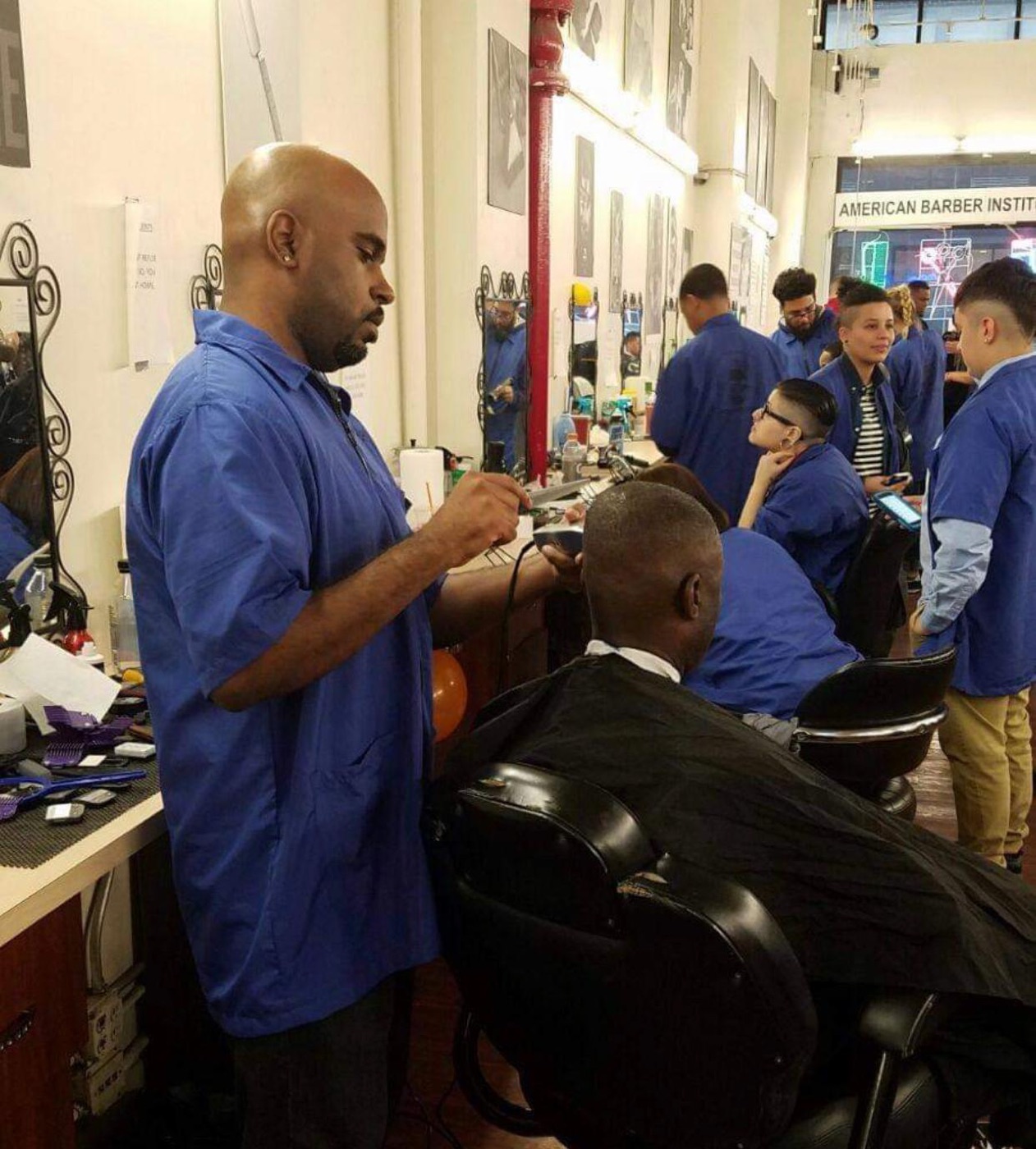 Barbershop interior with chairs and stations
